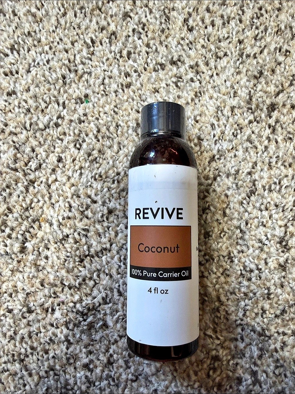 REVIVE Fractionated Coconut Carrier Oil New. new opened. Sealed.